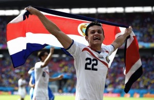 Jose Cubero celebrates Costa Rica reaching the World Cup's knockout stage for the first time since 1990.