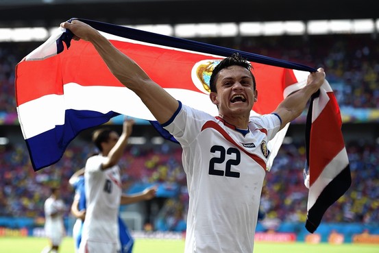 Jose Cubero celebrates Costa Rica reaching the World Cup's knockout stage for the first time since 1990.